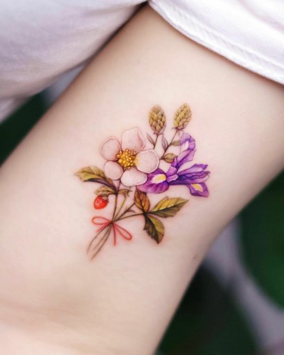 Tatuaże kwiatowe kolorowe - zobacz kobiece i piękne projekty na 2023 rok!